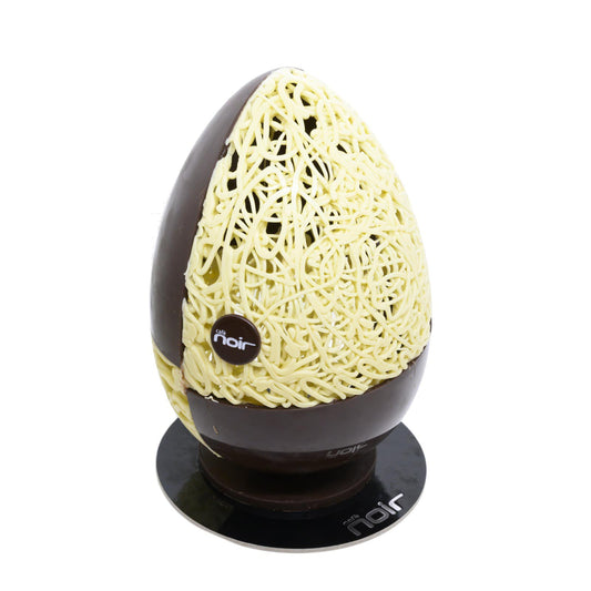 Uovo di Pasqua al cioccolato bianco e fondente